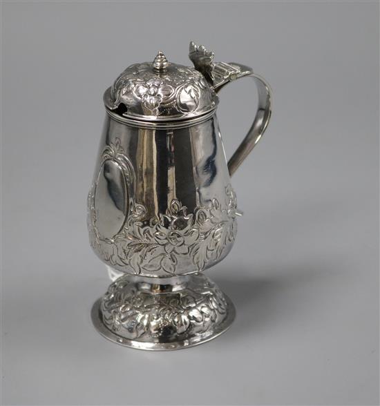 A late 19ct century Hanau? repousse white metal mustard pot (a.f.), 13cm